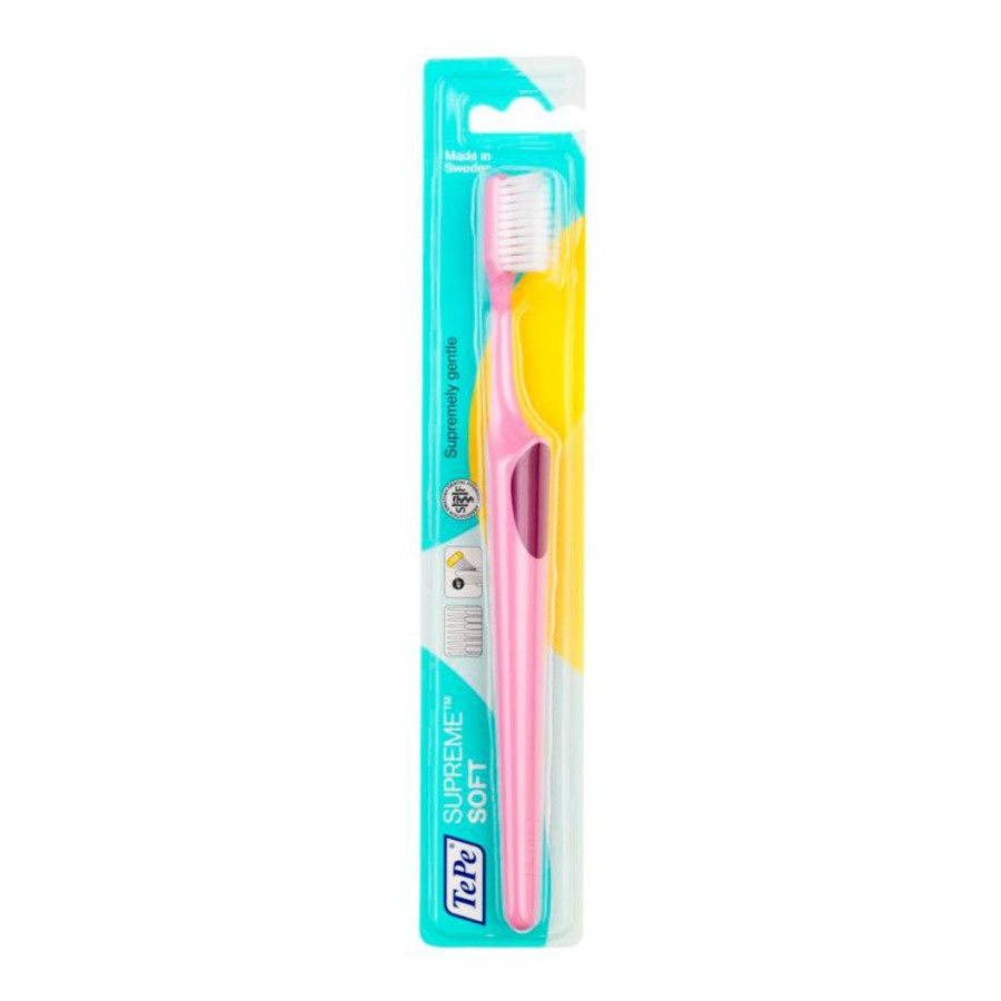 Spazzolino TePe Supreme rosa e giallo, confezionato in blister trasparente in plastica